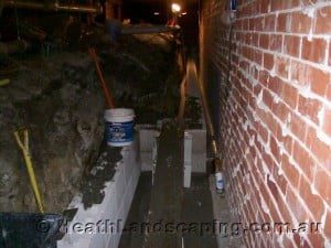 Excavation & Retaining Wall Under House Constructed by Heath Landscaping Southern Tasmania.