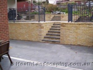 Paving With Retaining Walls Constructed byHeath Landscaping Tasmania - Transform Your Outdoor Space Today