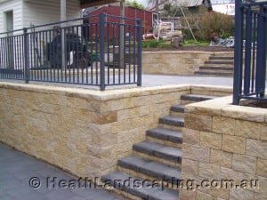 Paving With Retaining Walls Constructed by Heath Landscaping Tasmania - Transform Your Outdoor Space Today