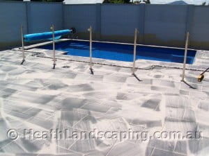 Paving around swimming pool Heath Landscaping Tasmania - Transform Your Outdoor Space Today